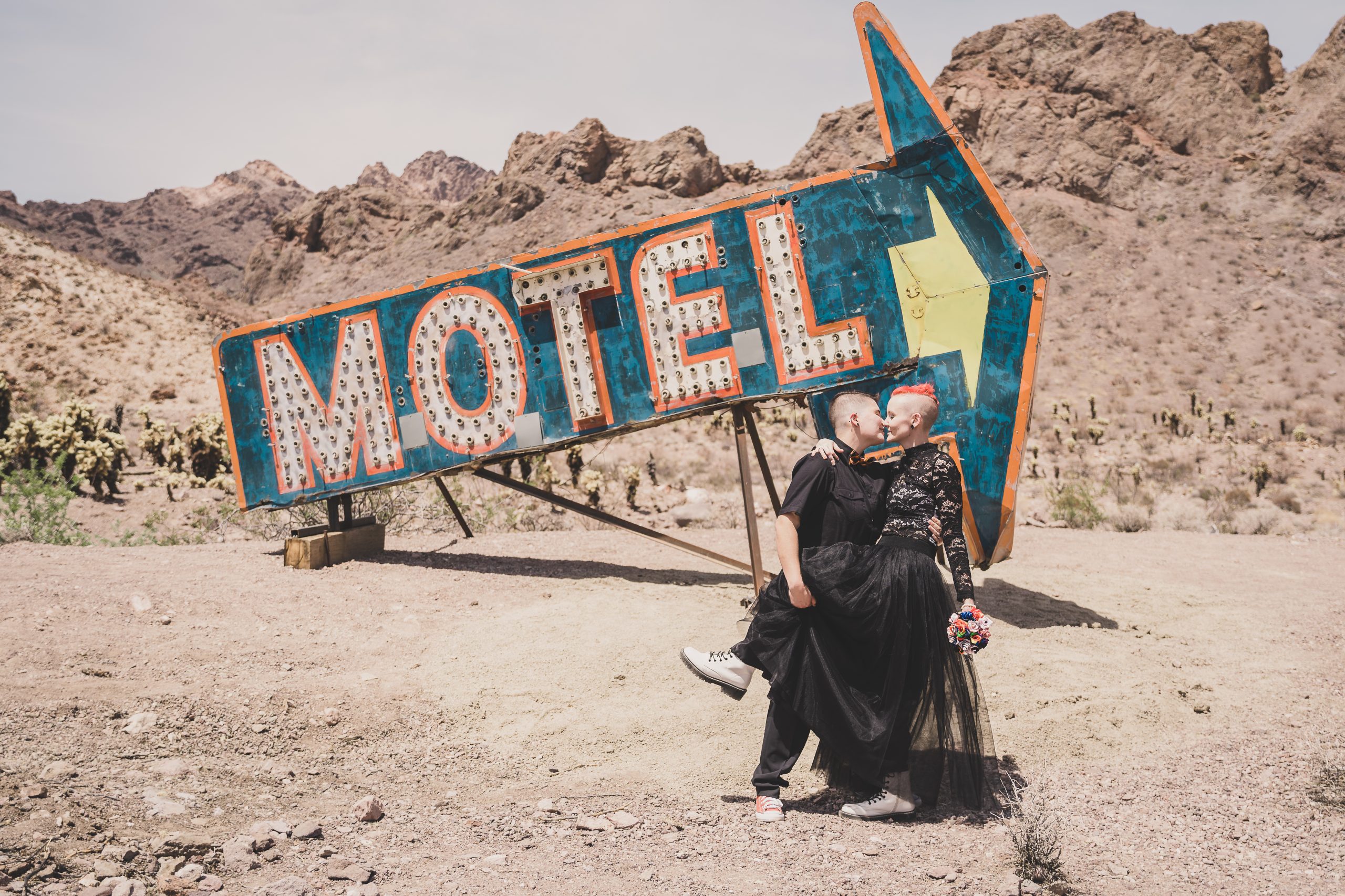 A couple poses after their elopement in the desert of Las Vegas, Nevada