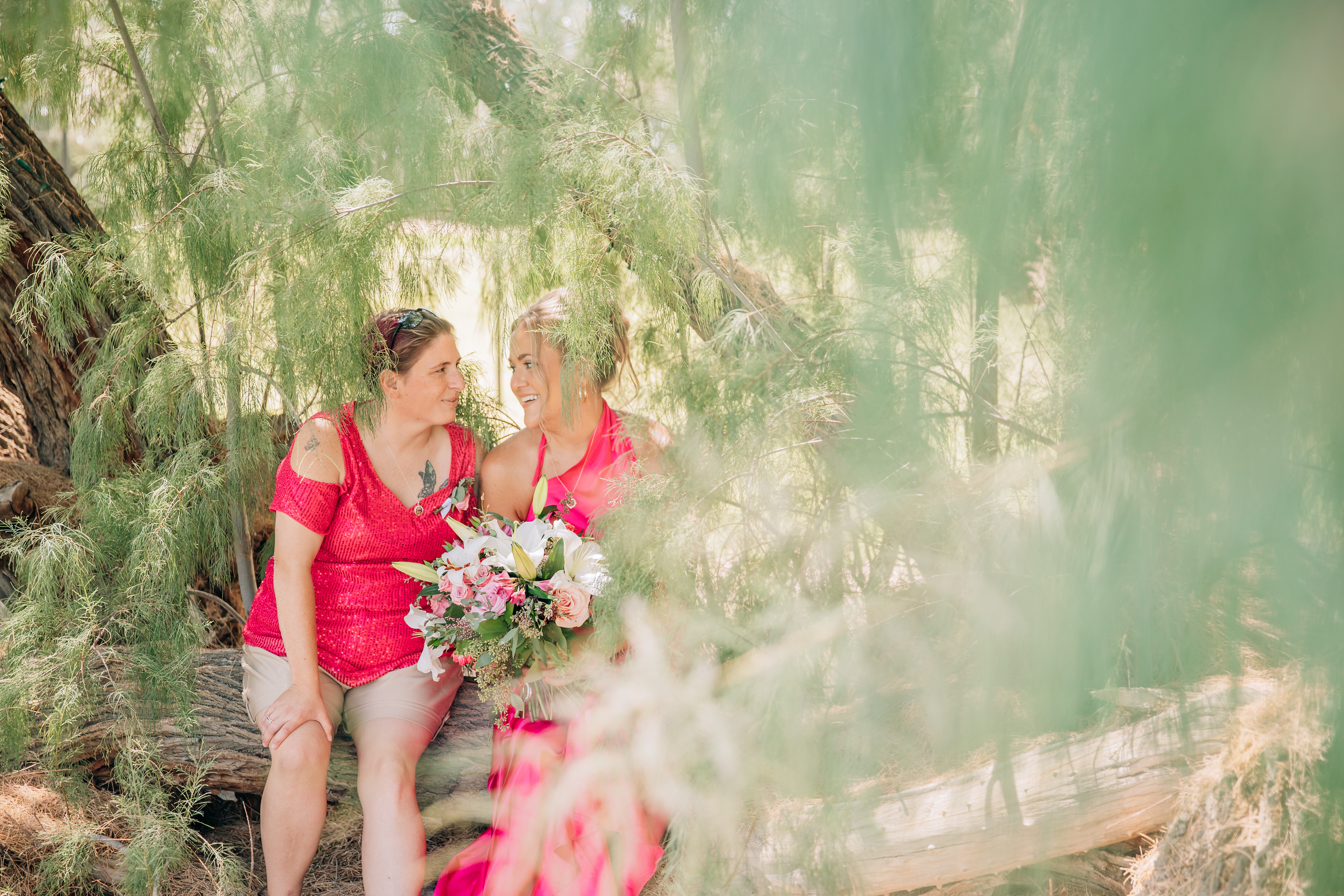 LGBTQ couple posing after their elopement ceremony at Greengale Farms in Las Vegas, Nevada